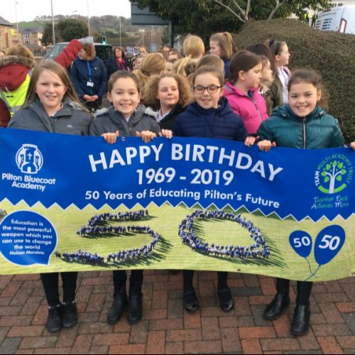 50th Birthday walk - Year 5 & 6 Girls with banner